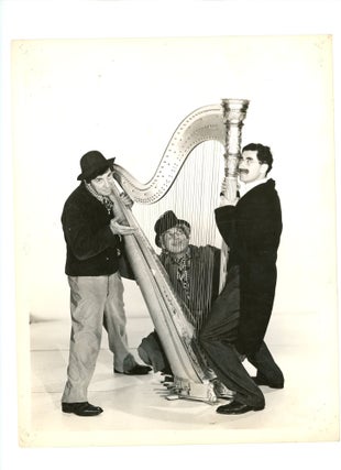 Item #000012475 Promotional Still Photograph of the Marx Brothers Gathered around a Harp. Marx...